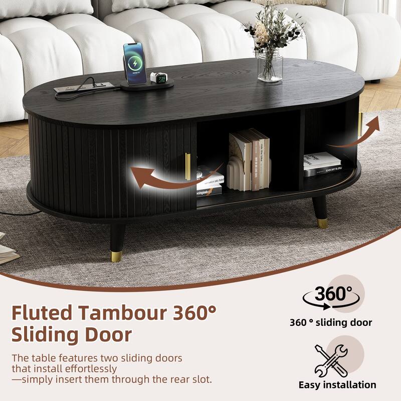 42.5" Mid-Century Oval Coffee Table – Solid Wood Fluted Design with Sliding Tambour Door & Built-In Charging Station.
