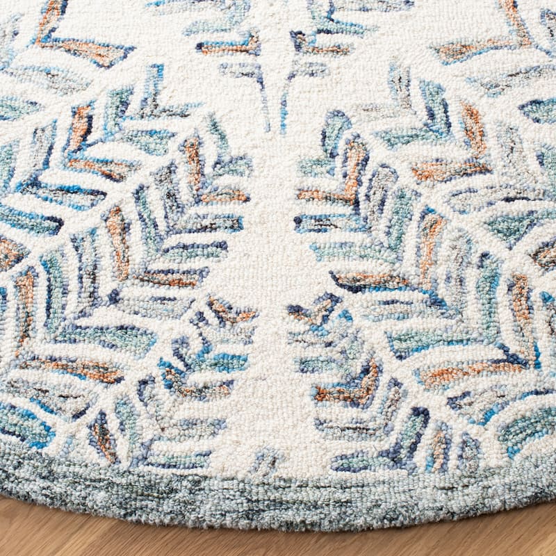 SAFAVIEH Handmade Capri Ilianka Wool Rug