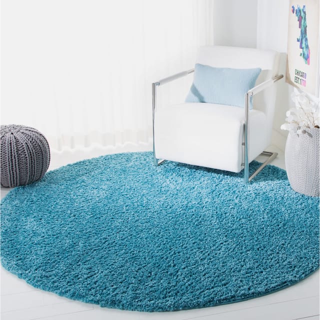 SAFAVIEH August Shag Solid 1.2-inch Thick Area Rug - 6'7" x 6'7" Round - Turquoise