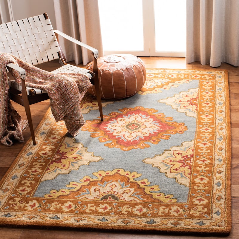 SAFAVIEH Handmade Heritage Surf Traditional Oriental Wool Rug - 5' x 8' - Blue/Rust