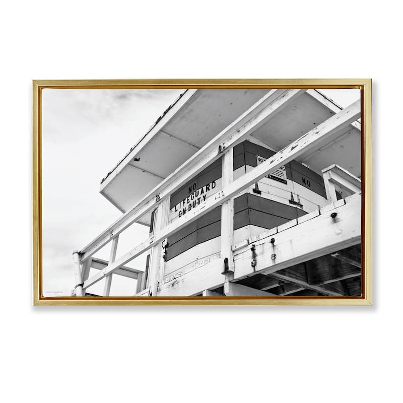 Stupell Lifeguard Building on Beach Framed Floater Canvas Wall Art Design By Seven Trees Design - 31 x 21 - Gold