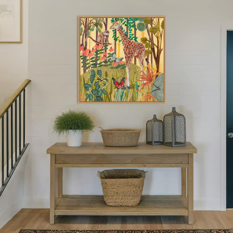 Giraffe in nature by Caroline Bonne Muller Framed Canvas Wall Art