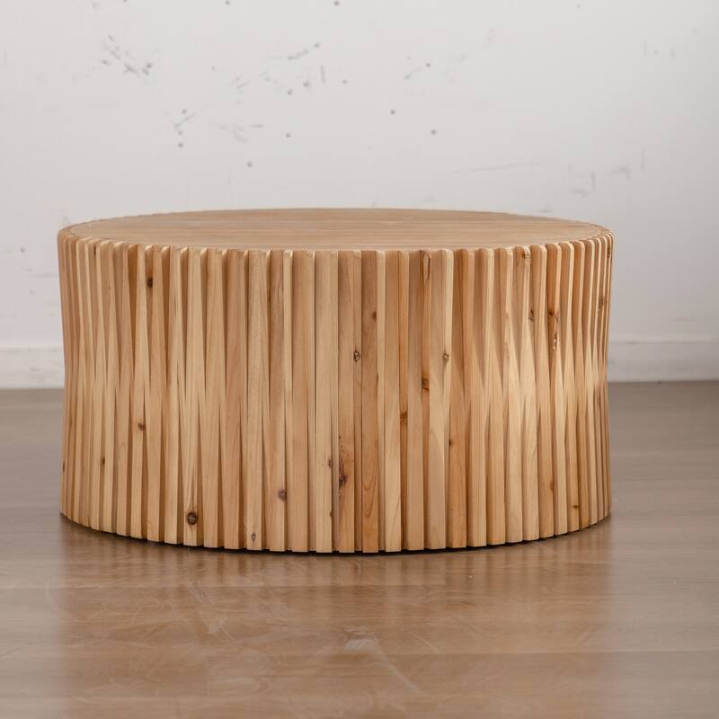 Cylindrical Coffee Table with Vertical Texture Relief Design