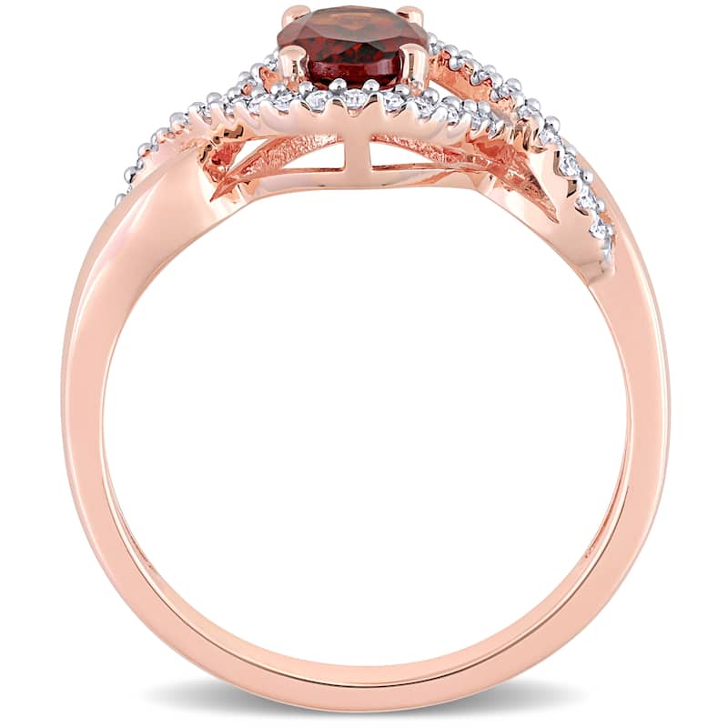 Miadora 10k Rose Gold Garnet and 1/6ct TDW Diamond Halo Infinity Ring