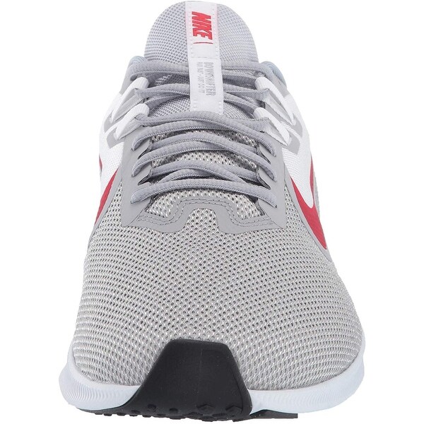red and gray nike shoes
