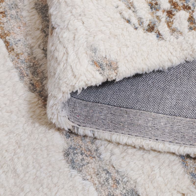 SAFAVIEH Handmade Casablanca Shag Dangira Wool High-Low Pile Rug