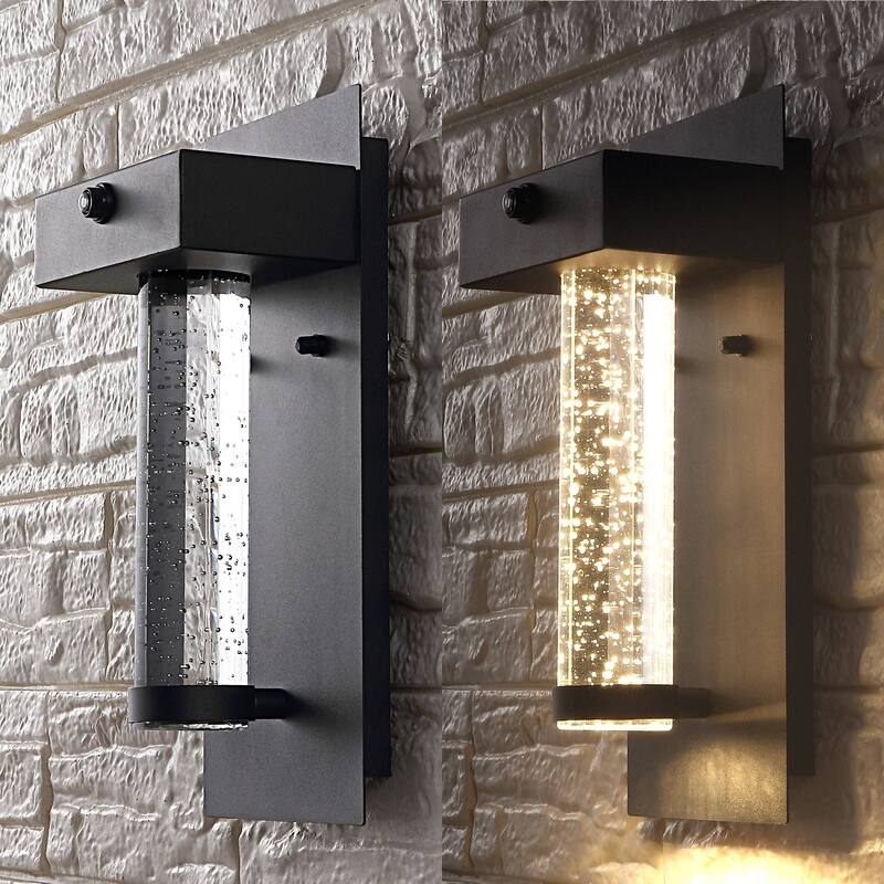 Juno 5.5" 1-Light Minimalist Iron/Seeded Glass with Dusk-to-Dawn Sensor Integrated LED Outdoor Sconce, Black by JONATHAN Y - 5.5
