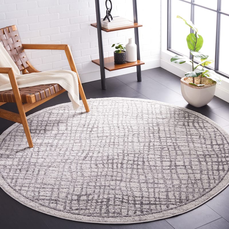 SAFAVIEH Adirondack Zoltanne Grid Distressed Rug - 4' Round - Silver/Ivory