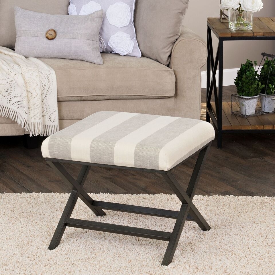 Alderson Upholstered Grey and Cream Striped Ottoman with Bronze Metal Finish. Opens flyout.