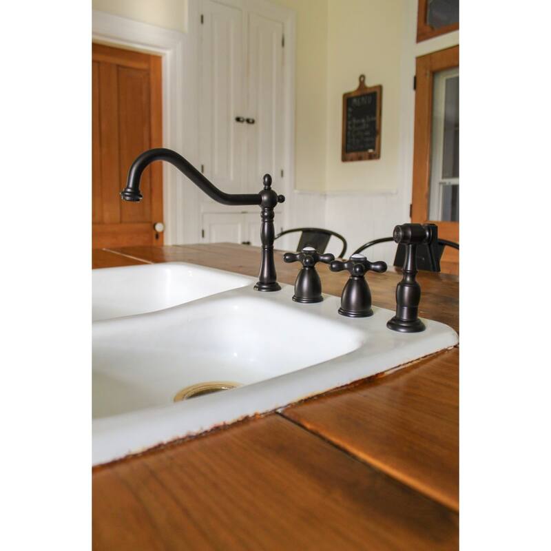 Kingston Brass Heritage 8-Inch Widespread Kitchen Faucet with Brass Sprayer