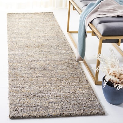 SAFAVIEH Handmade Himalaya Modern & Contemporary Solid Ivory Wool Rug