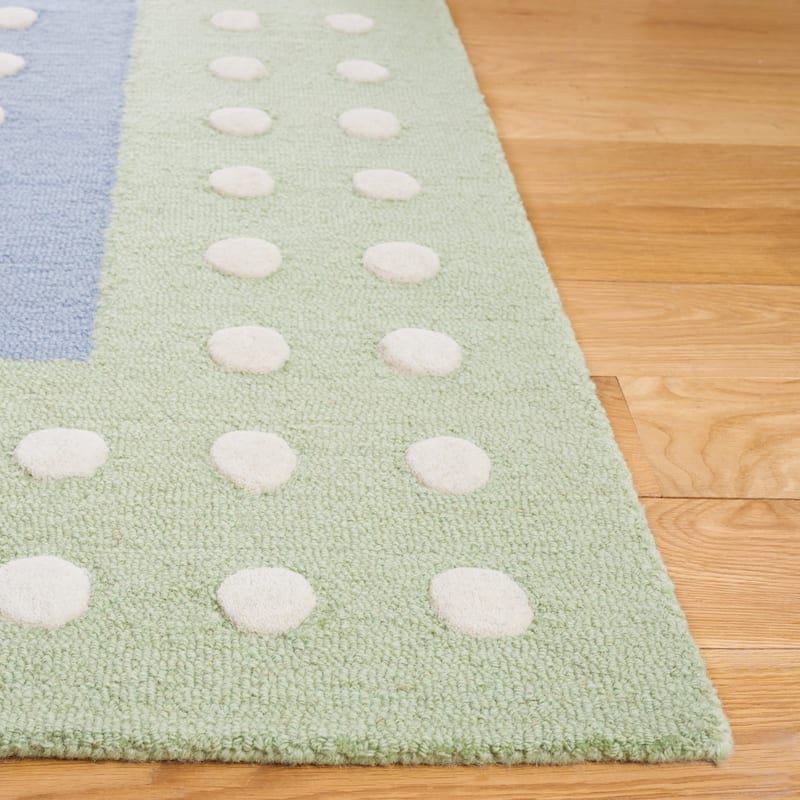 SAFAVIEH Handmade Kids Kenia Dots Wool Rug