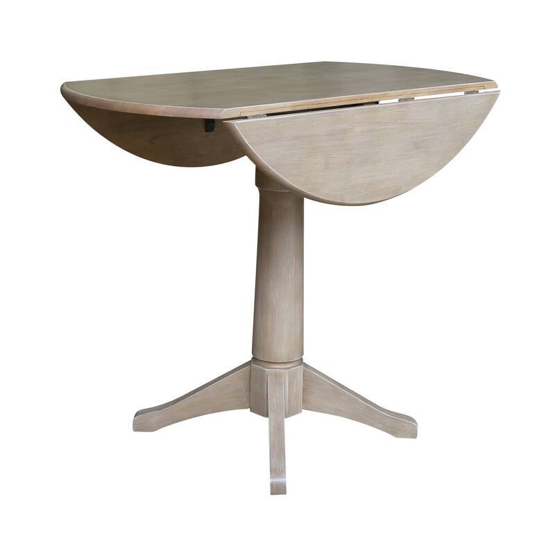 42 in. Round Top Dual Drop Leaf Pedestal Dining Table