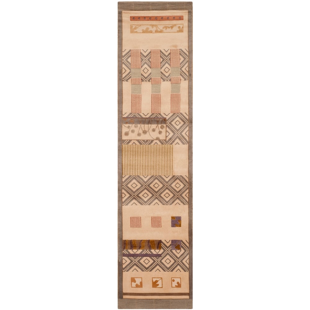 SAFAVIEH Couture Hand-knotted Tibetan Sabella Modern Wool Rug