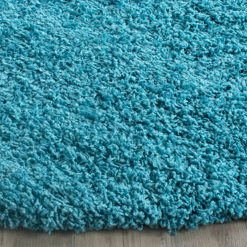 SAFAVIEH Laguna Shag Verdiana Solid Color 2-inch Thick Rug.