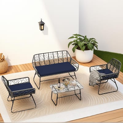 4-piece wicker patio furniture set with tempered glass table, detachable blue cushion cover for easy cleaning,Suitable f