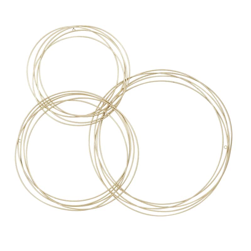 Metal Plate Overlapping Ring Home Wall Decor - Black or Gold - CosmoLiving by Cosmopolitan