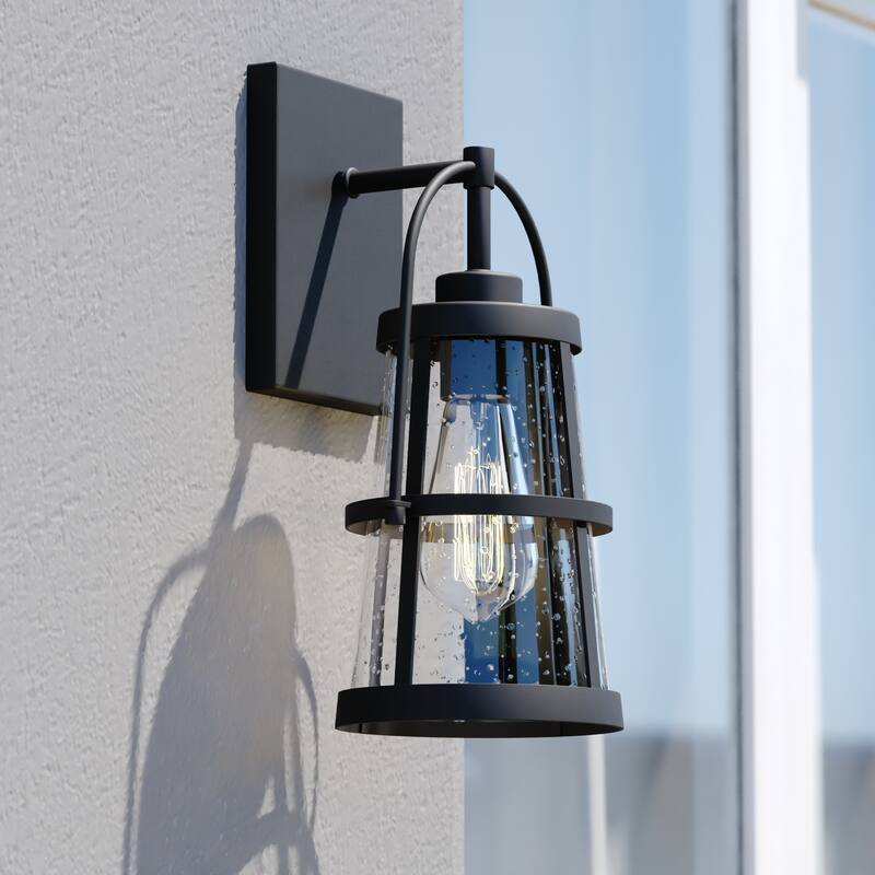 VAXCEL Portage Park 12.75 in. H 1-Light Matte Black Dusk to Dawn Sensor Outdoor Wall Sconce, Steel, Clear Seeded Glass Shade - Matte Black - 6.5-in W x 12.75-in H x 7-in D