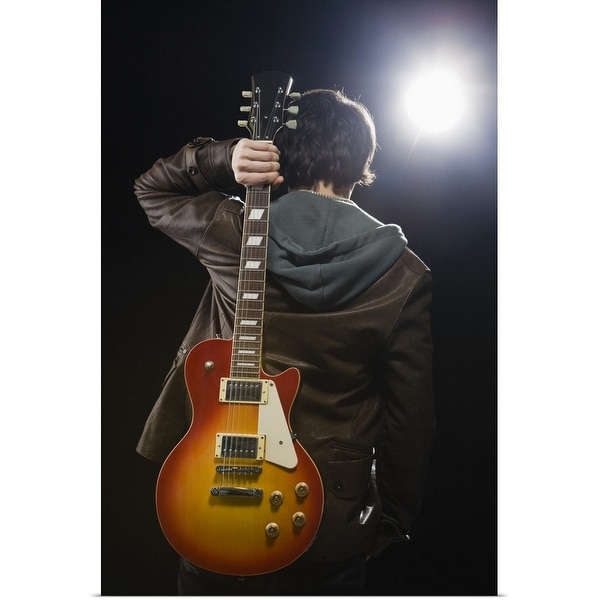 "Man with guitar in spotlight" Poster Print