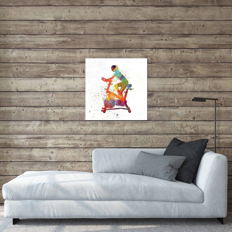 Woman Riding An Exercise Spin Bike In The Gym Print On Acrylic Glass by Paul Rommer