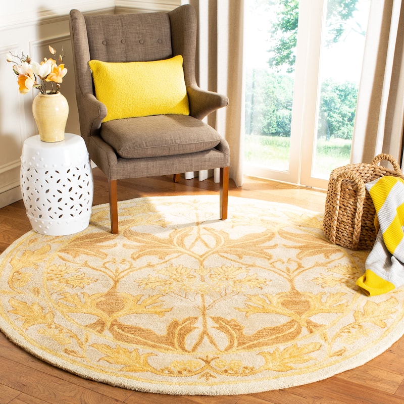 SAFAVIEH Handmade Anatolia Sevinj Traditional Oriental Wool Rug - 4' Round - Beige/Gold