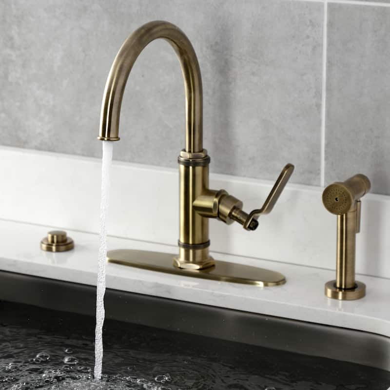 Kingston Brass Whitaker Single-Handle Deck Mount Kitchen Faucet with Brass Sprayer