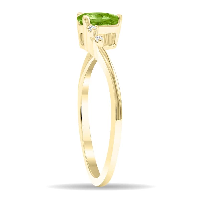Women's Pear Shaped Peridot and Diamond Wave Ring in 10K Yellow Gold