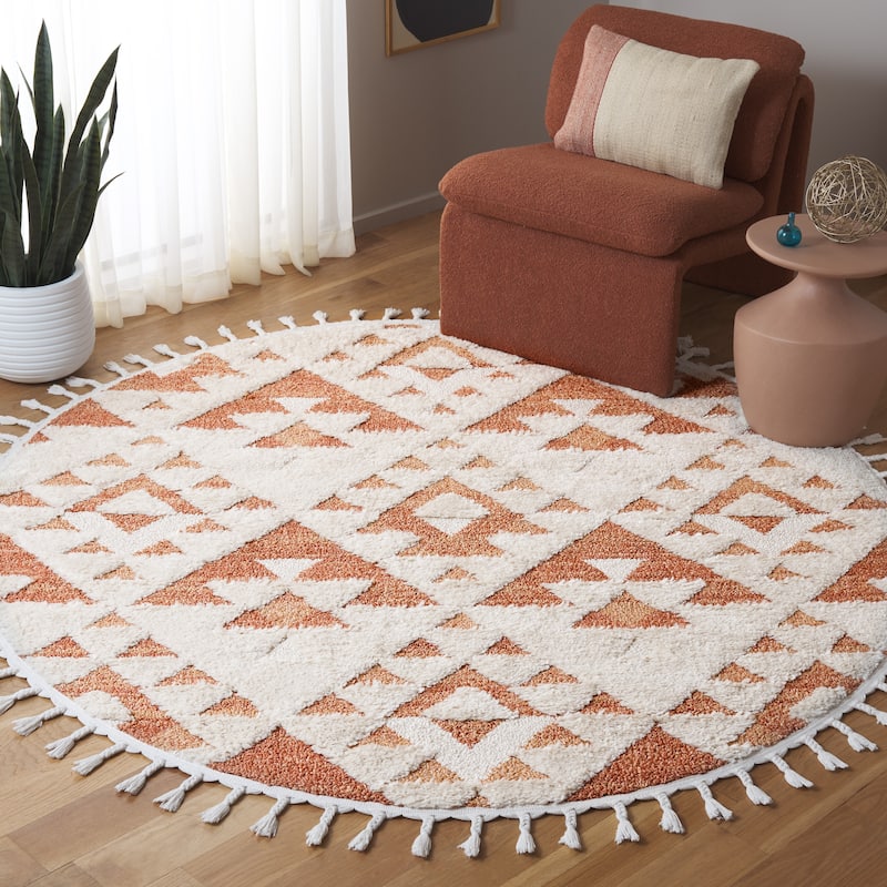 SAFAVIEH Moroccan Tassel Shag Delores 2-inch Thick Rug - 8' Round - Ivory/Brick Rust
