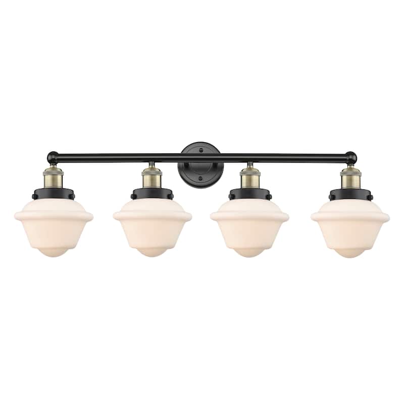Innovations Lighting Oxford - 4 Light 34" Bath Vanity Light - Black Antique Brass/Matte White