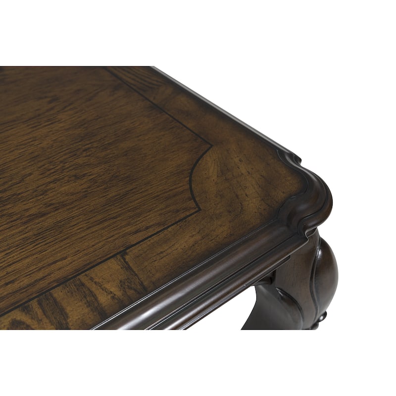 Signature Design by Ashley Maylee Dark Brown Coffee Table - 50" W x 37" D x 20" H