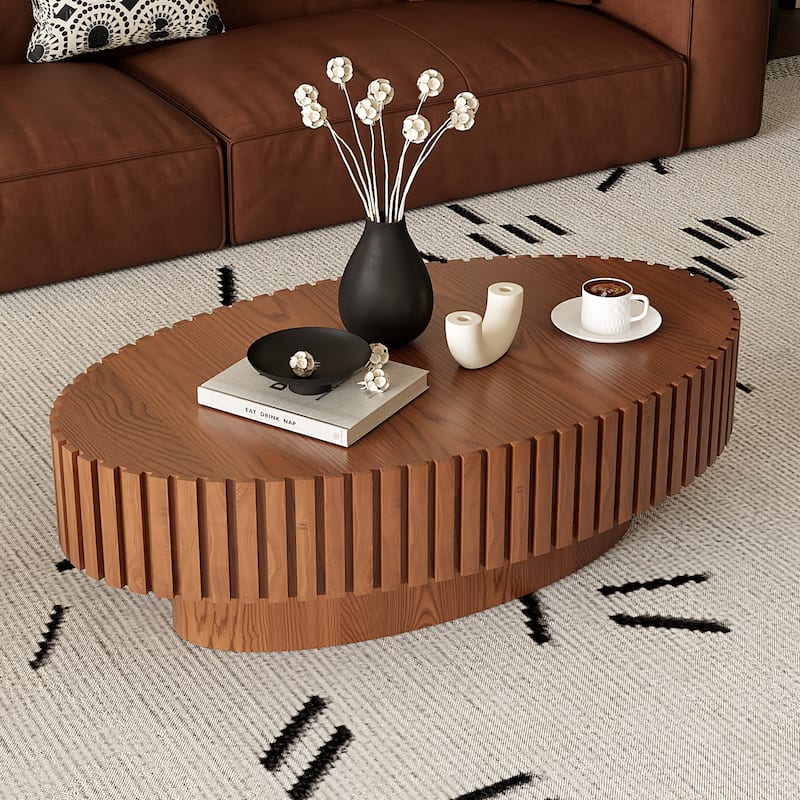 Handcrafted Relief Oval Coffee Table with Sturdy Pedestal - Natural Wood