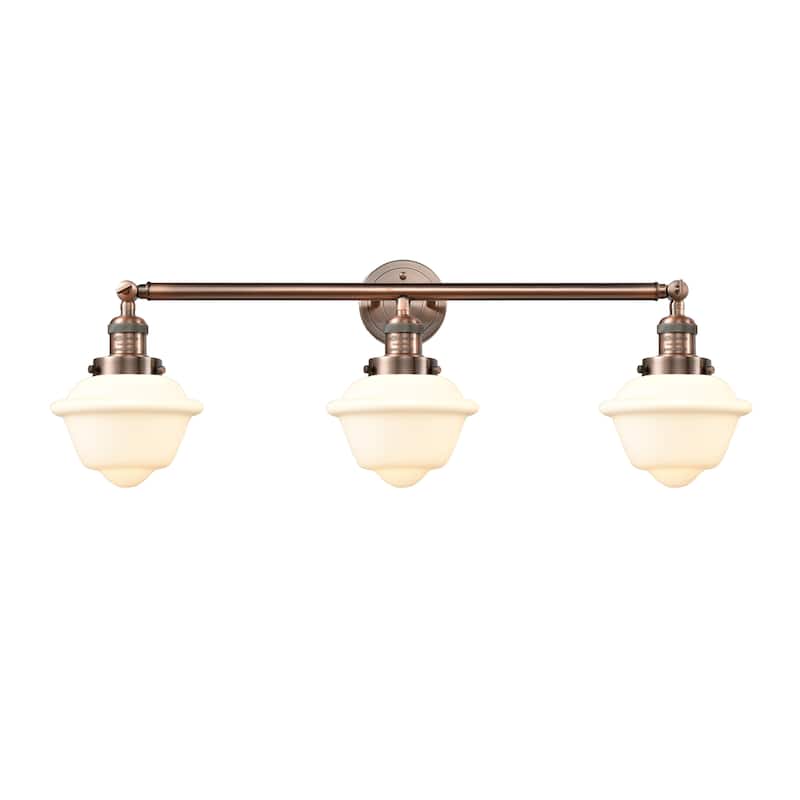 Innovations Lighting Oxford - 3 Light 34" Bath Vanity Light - Antique Copper/Matte White