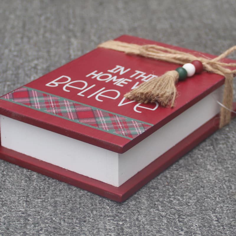 In This Home We Believe Wood Faux Books Decorative Sign with Twine and Beads