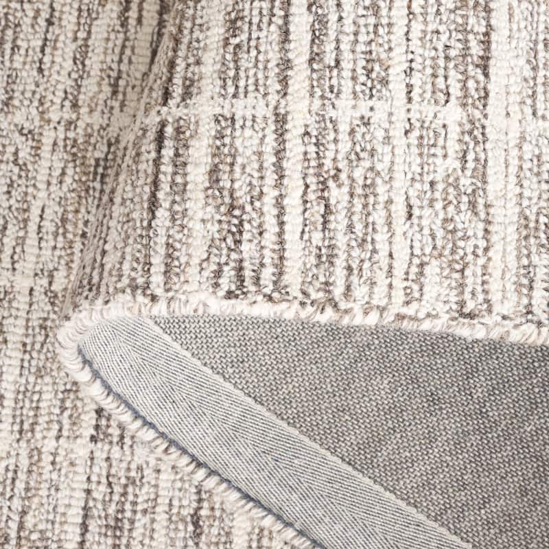 SAFAVIEH Handmade Ebony Peigi Contemporary Wool Rug