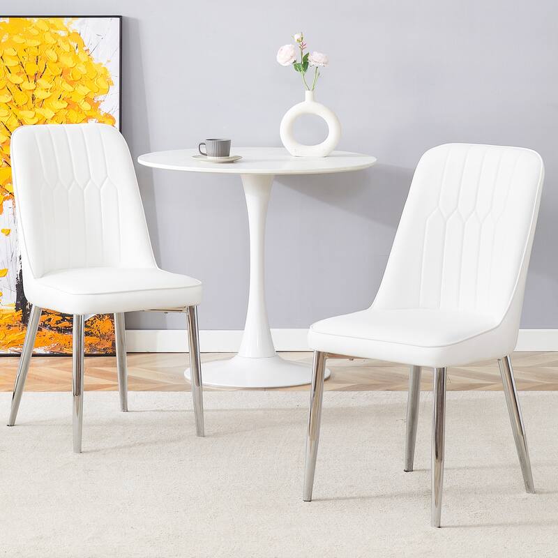 2 modern dining chairs, smooth PU leather backrest and silver-toned metal legs for a comfortable home experience