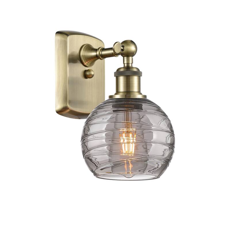 Innovations Lighting 516-1W-10-6 Athens Deco Swirl Sconce Athens Deco - Antique Brass / Light Smoke Deco Swirl