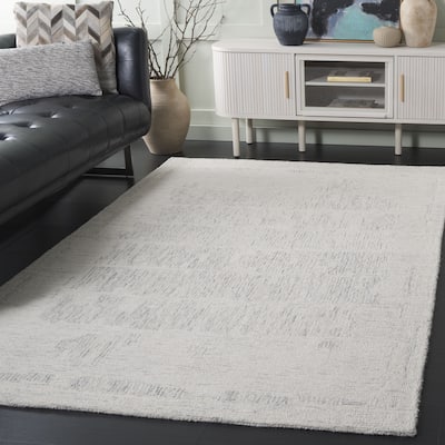 SAFAVIEH Handmade Ebony Isaurinda Wool Rug