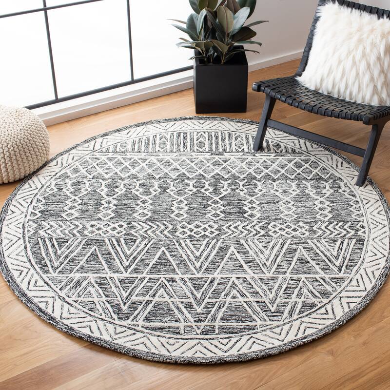SAFAVIEH Handmade Abstract Jevhen Modern Wool Rug - 6' Round - Ivory/Black