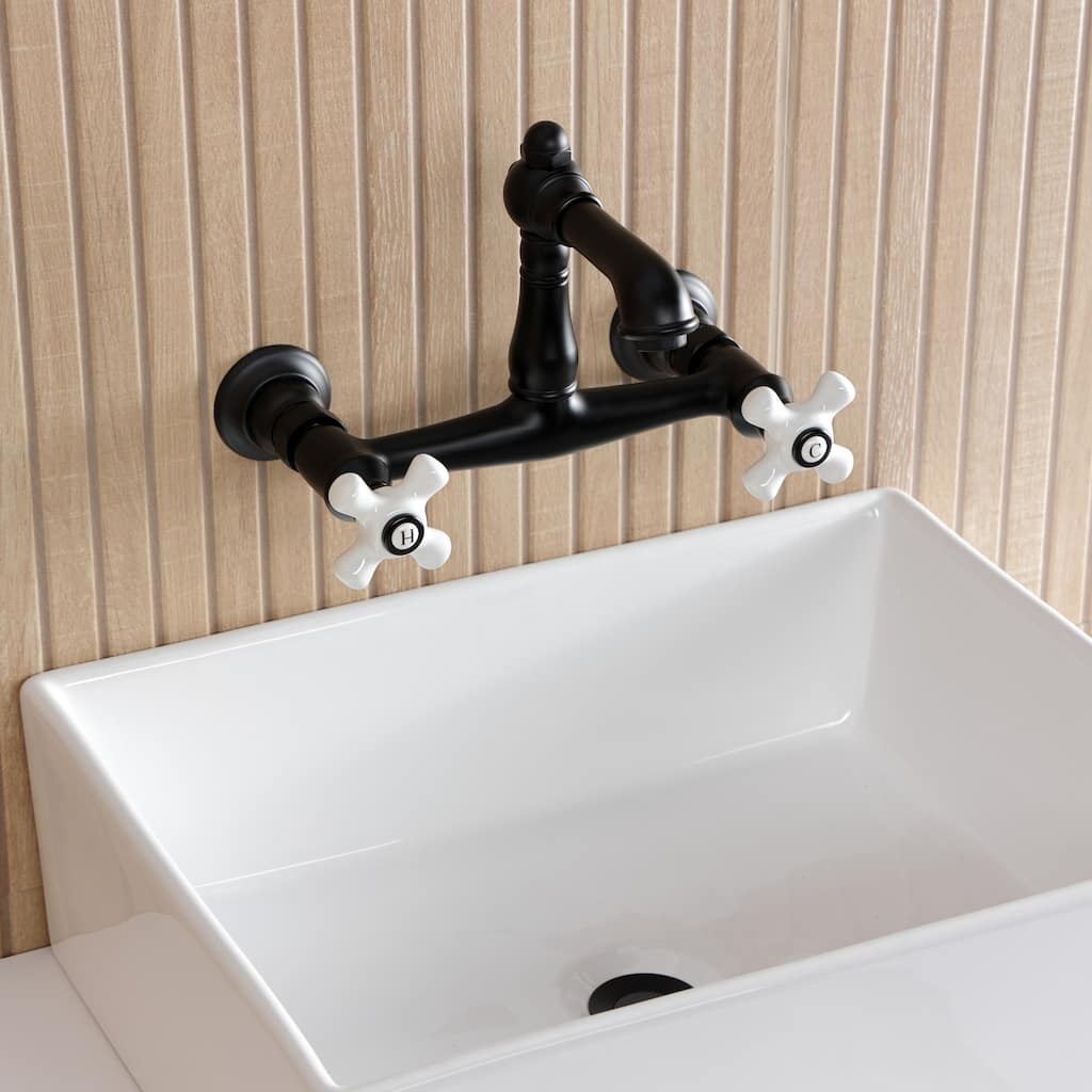 Kingston Brass English Country Two-Handle 2-Hole Wall Mount Bathroom Faucet