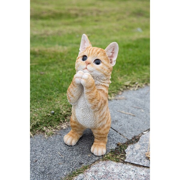 orange tabby cat statue