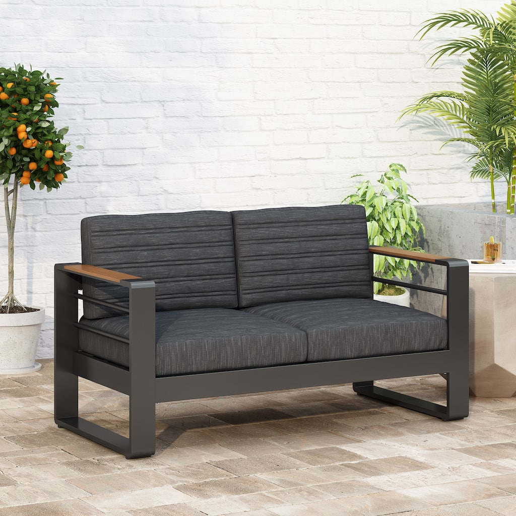 Giovanna Outdoor Black Aluminum Loveseat with Charcoal Cushions by Christopher Knight Home - 56.75" L x 27.50" W x 24.75" H