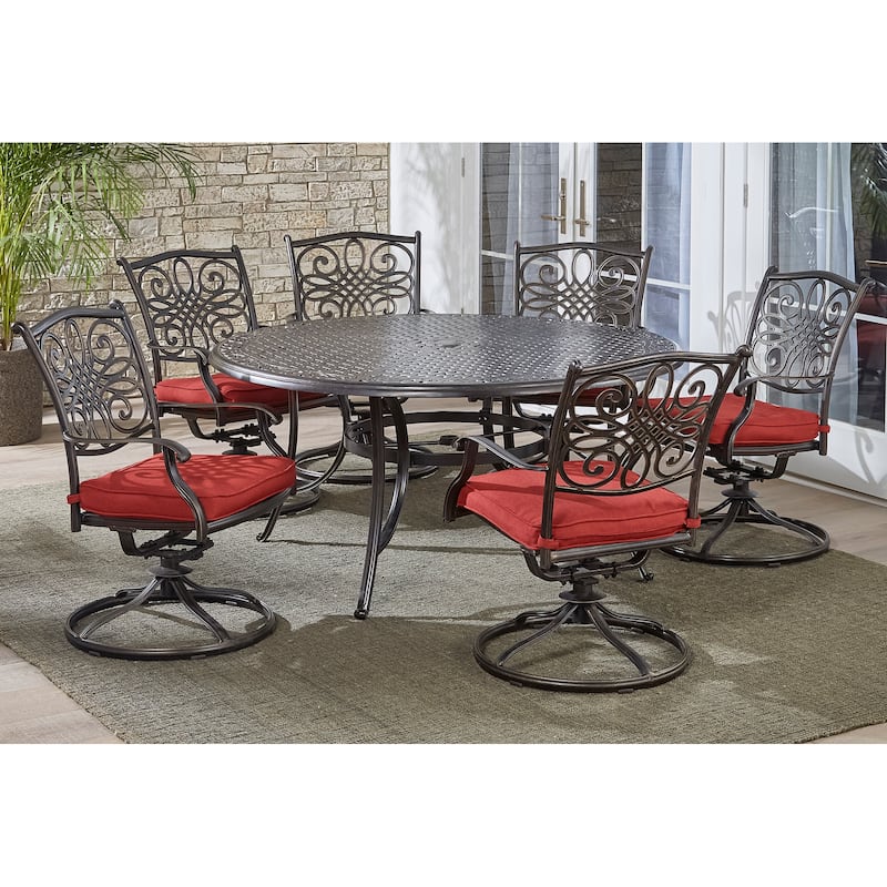 Hanover Traditions 7-Piece Dining Set in Red with a 60 In. Round Cast-top Table and Six Swivel Rockers