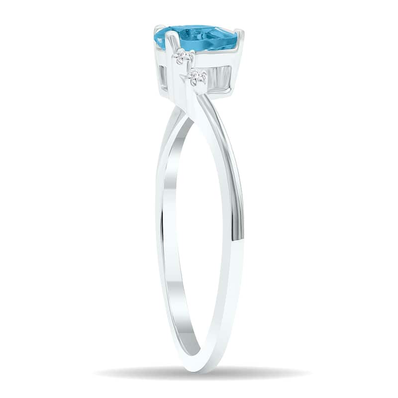 Women's Blue Topaz and Diamond Wave Ring in 10K White Gold