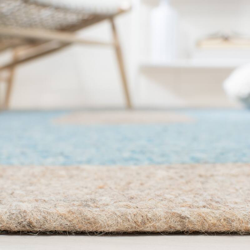 SAFAVIEH, Handmade Braided Sirlei Wool Rug