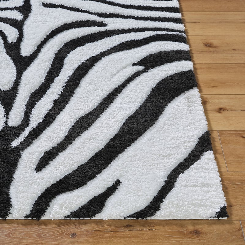 Livabliss Nomadic Animal Print Plush Area Rug