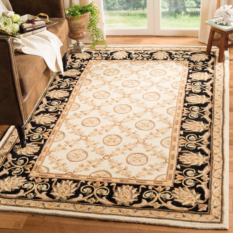 SAFAVIEH Handmade Naples Kuralay Traditional Oriental Wool Rug - 4' x 6' - Ivory/Black