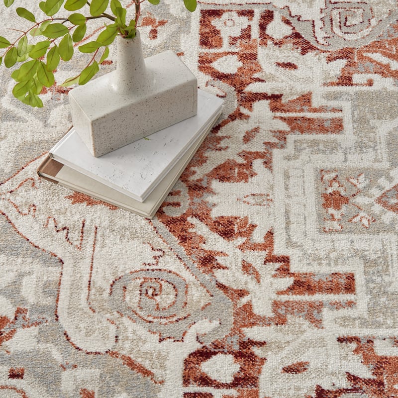 Nourison Geneva Traditional Bordered Area Rug.