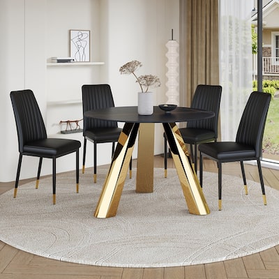 A 42-Inch Round Black Dining Table With A Granite Top And Stainless Steel Legs, Paired With Four Pu Material Dining Chairs