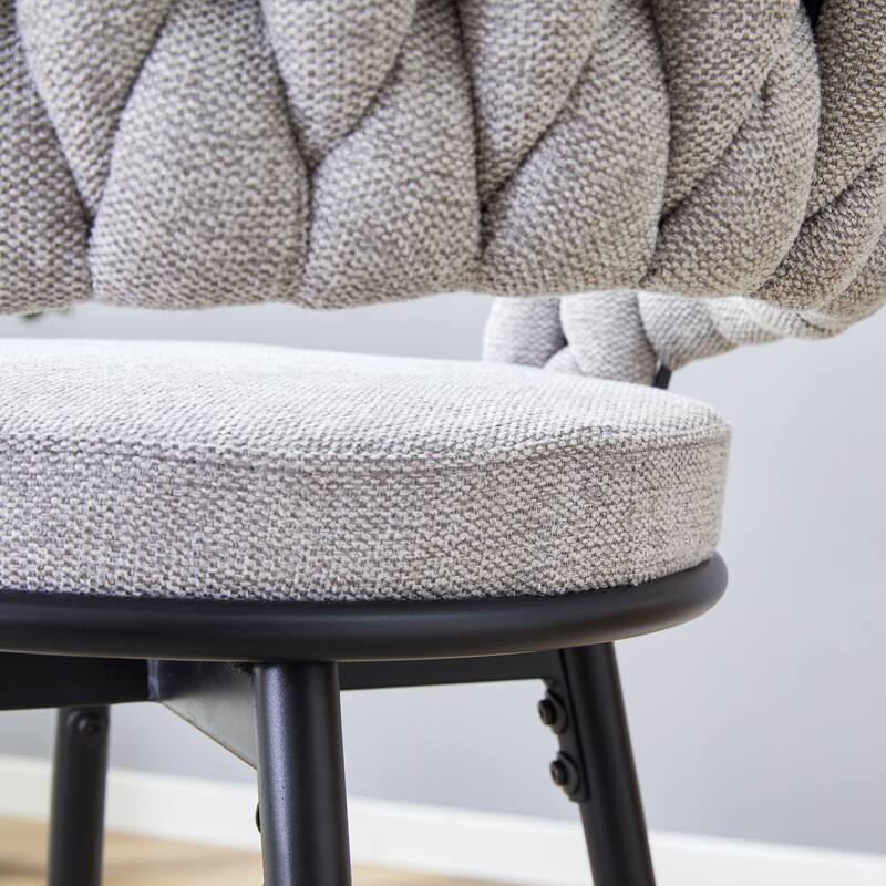A Set Of Four Rotating Bar Stools With Breathable Cotton And Linen Cushions