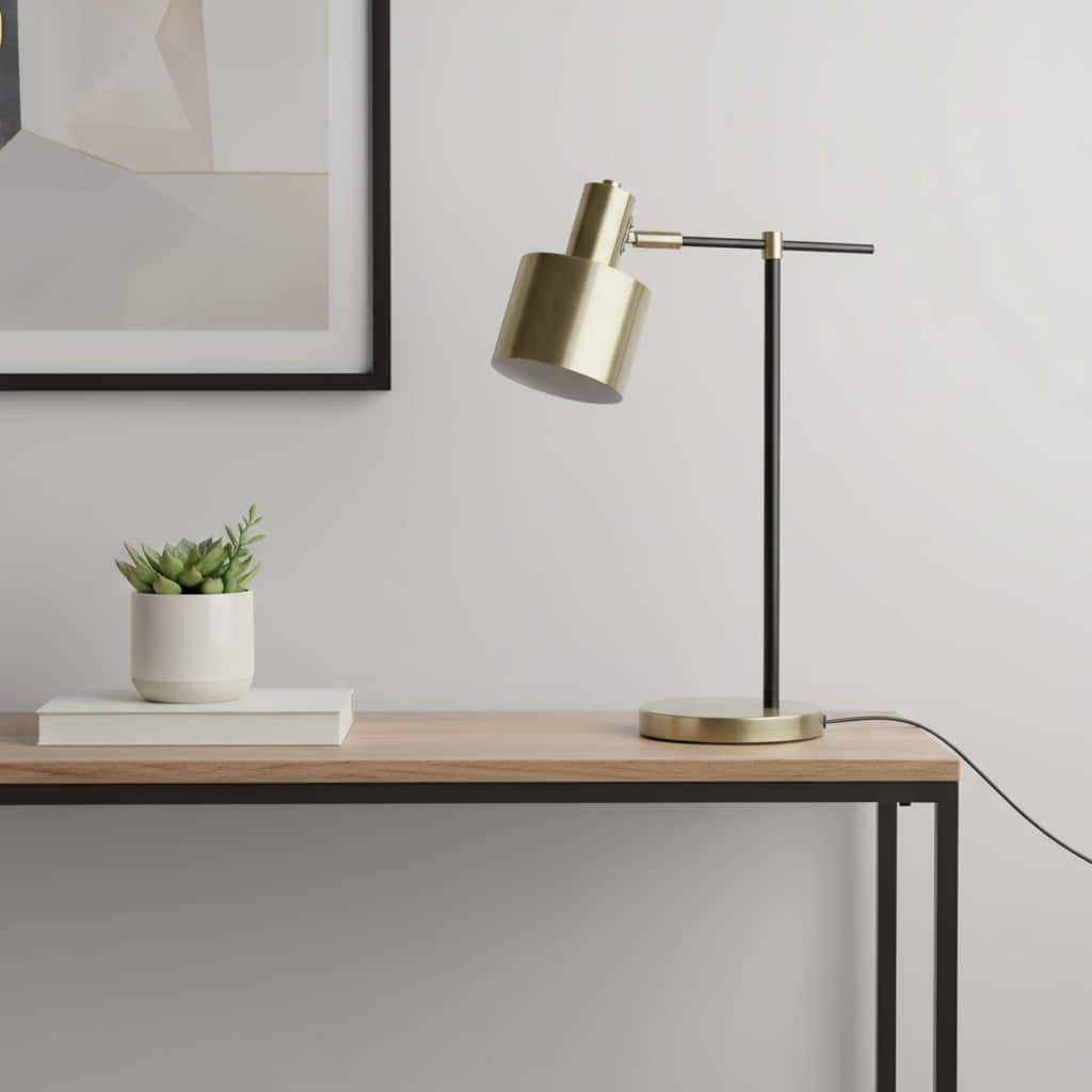 HomeRoots 22" Antiqued Brass And Black Metal Table Lamp With Antiqued Brass Globe Shade - 7.00 in. x 21.80 in. x 15.50 in.